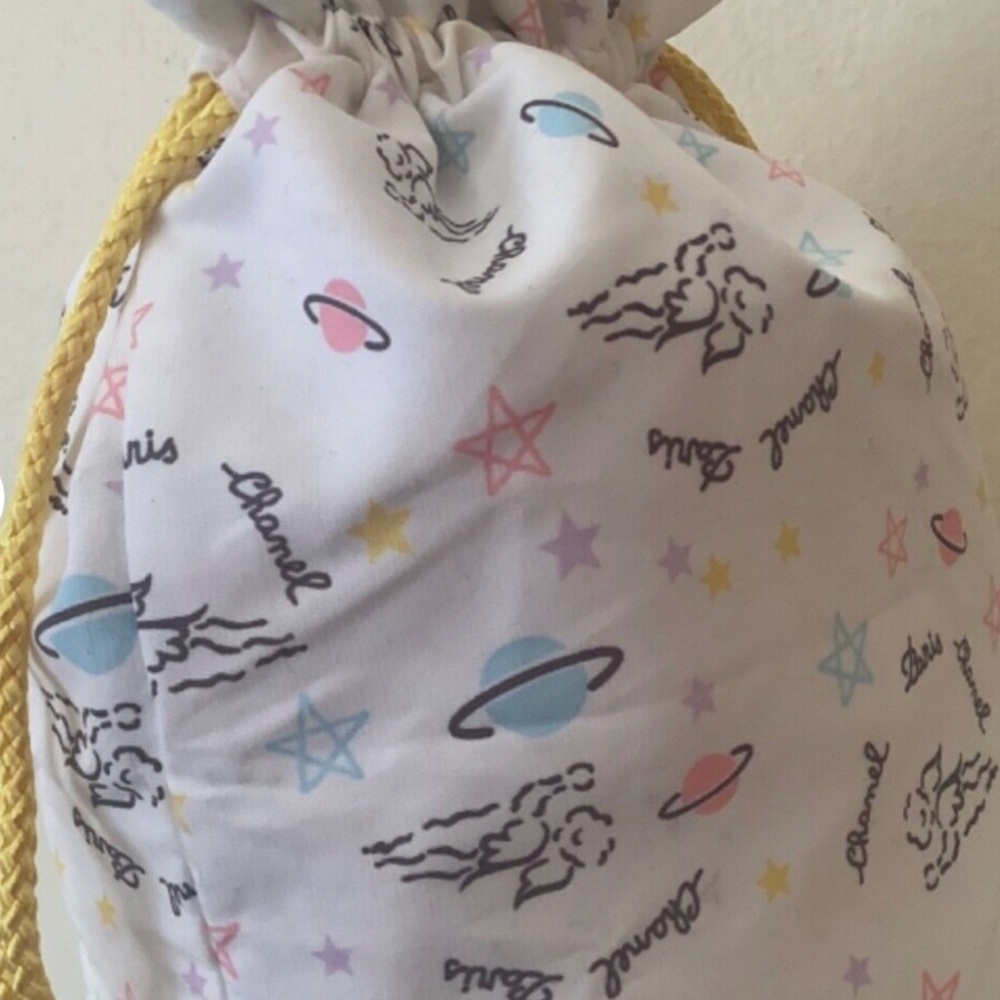 CHANEL Cosmic Print Drawstring Bag - White and Yellow. Vintage- Rare to find